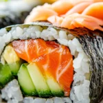 Freshly prepared sushi burrito with salmon, avocado, and rice.